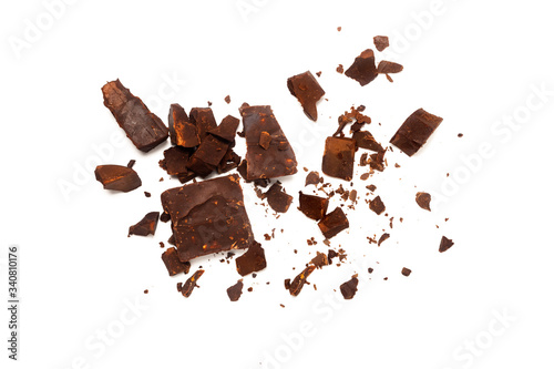 chocolate black pieces pile with almonds on white background
