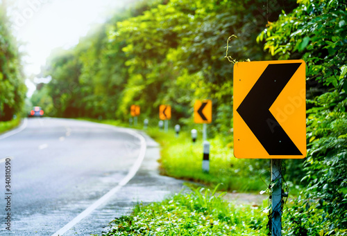 Road Traffic Transportation Sign. Sharp Curve To The Left