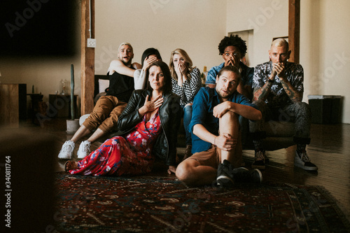 In front of the television