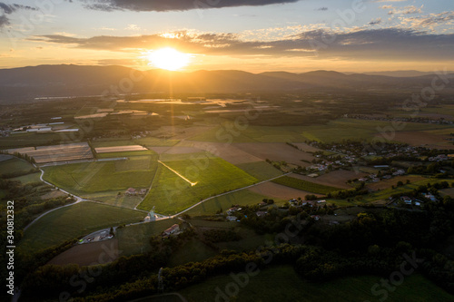 Aerial view of rural Isère with forest and houses