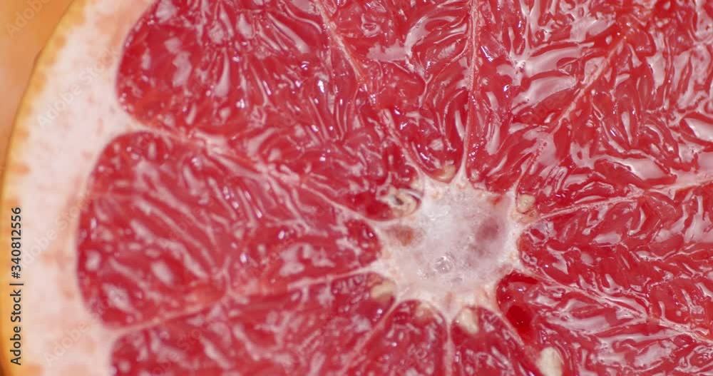 Slice of juicy ripe red grapefruit. Slice of juicy ripe red grapefruit.