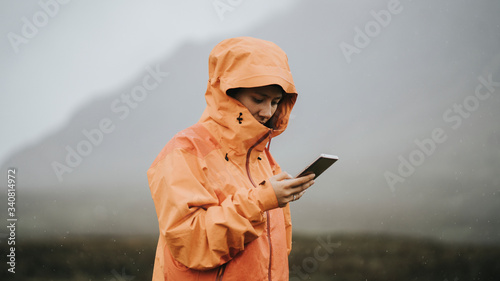 Εκτύπωση καμβά Orange raincoat in the rain