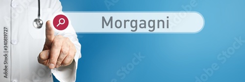 Morgagni. Arzt im Kittel zeigt mit dem Finger auf ein Suchfeld. Der Begriff Morgagni steht im Fokus. Symbol für Krankheit, Gesundheit, Medizin photo