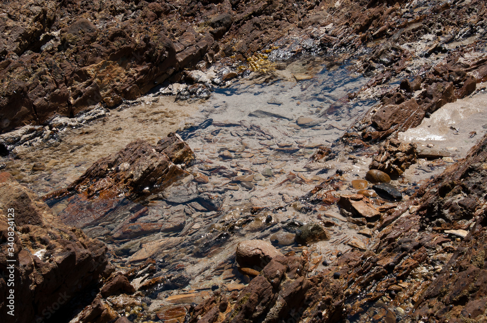 Mossy Point Australia, view into a rock pool along the beach Mossy Point Australia, view into a rock pool along the beach