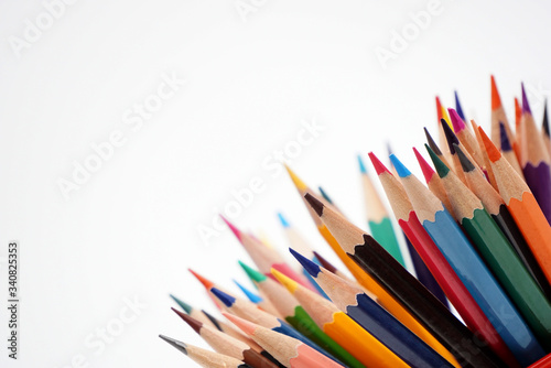 color pencils with white background, concept learning tools.