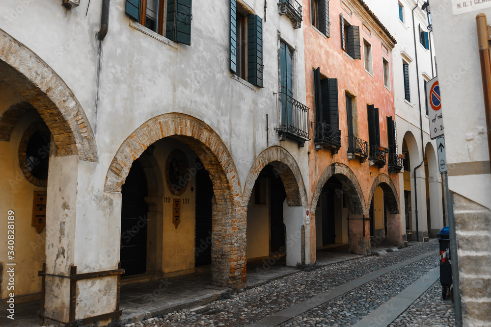Ancient streets with arches in the walls of houses made of wild stone | VENICE, ITALY - 16 SEPTEMBER 2018. 