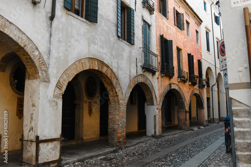 Ancient streets with arches in the walls of houses made of wild stone | VENICE, ITALY - 16 SEPTEMBER 2018. 