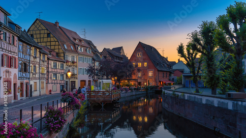 Colorful traditional french houses on the side of river Lauch in Petite Venise, Colmar, France