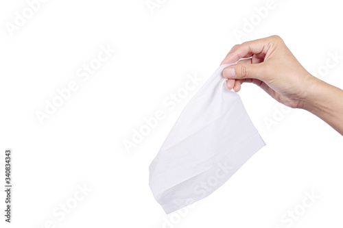 Hand holding tissue paper isolated on white background
