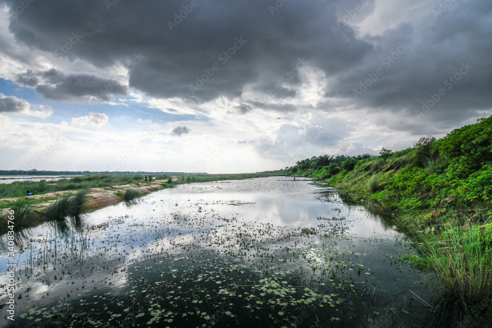 Cloudy evening of a river