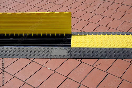 Safety rubber cable protection cover for scene or outdoor events.