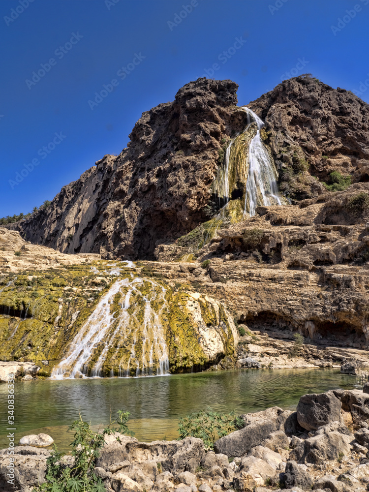 Beautiful Darbat waterfall, has two floors and forms several lagoon. Oman