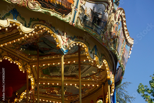 Details of a traditional Venetian carousel at the funfair.Carousel, traditional fairground ride. © fotosen55