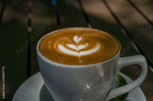 Freshly brewed coffee with milk froth art