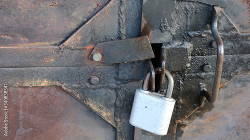 new light metal lock on rough dark iron doors