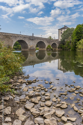 Old stone bridge over the Lahn river in Limburg, Germany