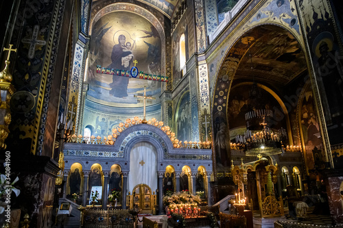 Interior of the St. Volodymyr's Cathedral with altar and fragments of frescoes wall paintings. Kyiv, Ukraine. April 2020