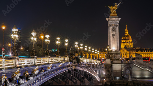 Beautiful view of Pont Alexandre III, bridge with golden sculptures and street lamps, Paris, France © othman