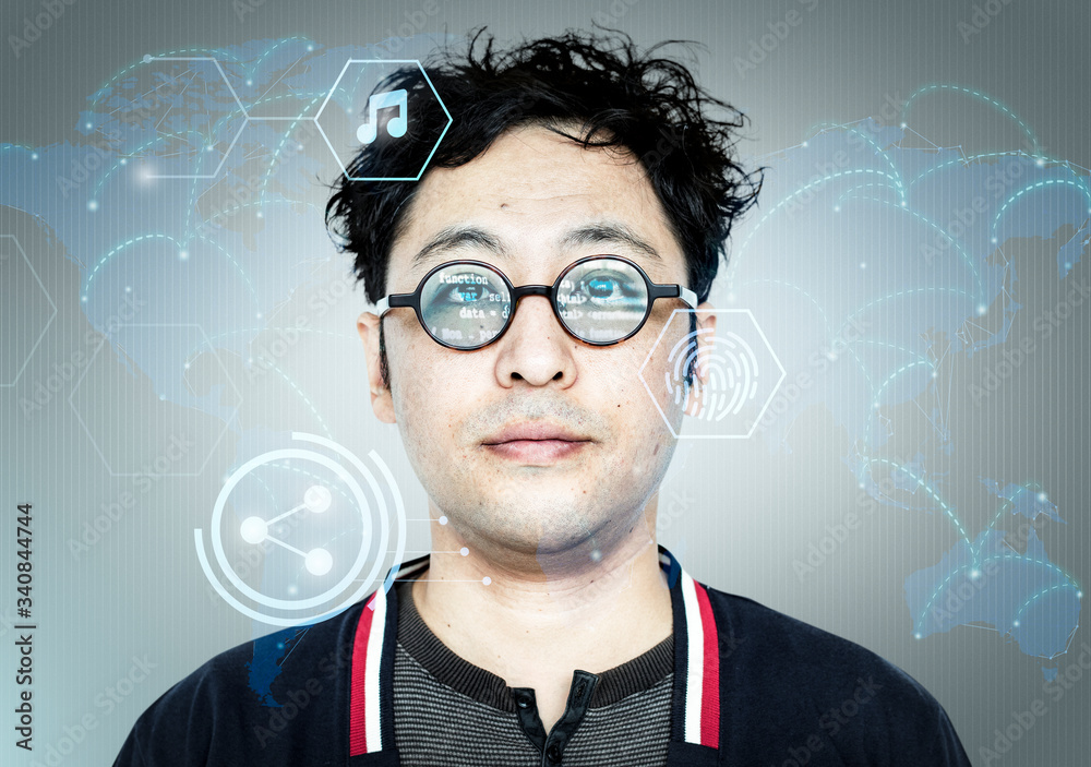 Asian hacker with computer code on his glasses Asian hacker with computer code on his glasses