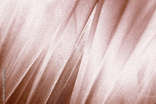 Copper snakeskin fabric texture photo