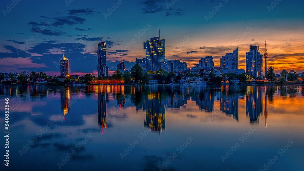 Panoramic cityscape image of Vienna capital city of Austria during sunset.