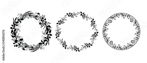 Set of silhouettes of wreaths of field herbs and plants. Black vector round frames isolated on white background. Medicinal flowers, twigs, leaves. Template design for print, cosmetics, tea, pharmacy.