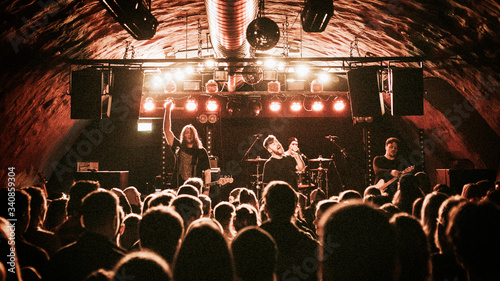 Photos Band playing in a concert