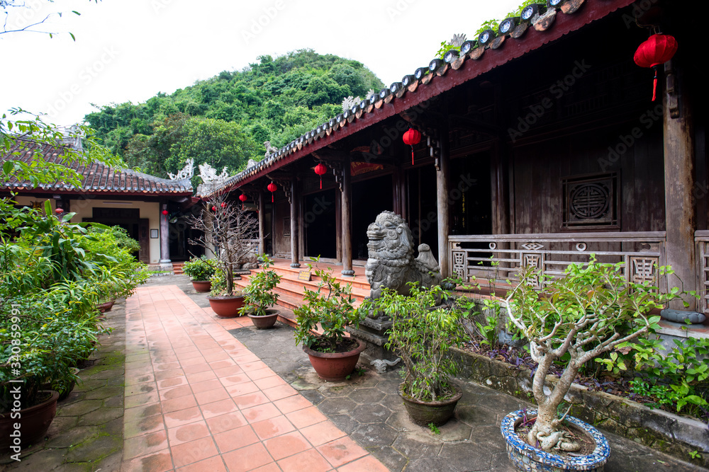 Danang, Vietnam - December 8 2019 : Buddhist temple at Marble mountains in Danang, Central Vietnam. Danang, Vietnam - December 8 2019 : Buddhist temple at Marble mountains in Danang, Central Vietnam.
