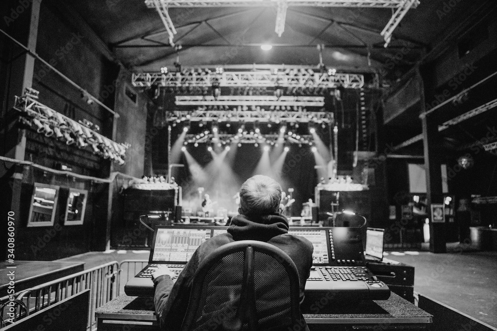 Sound engineer at soundcheck of a concert