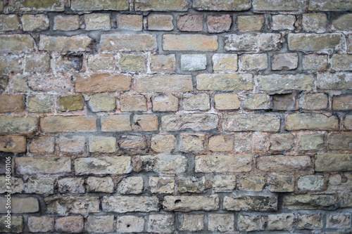 Artistic classic background grunge background view with old brick wall fence.