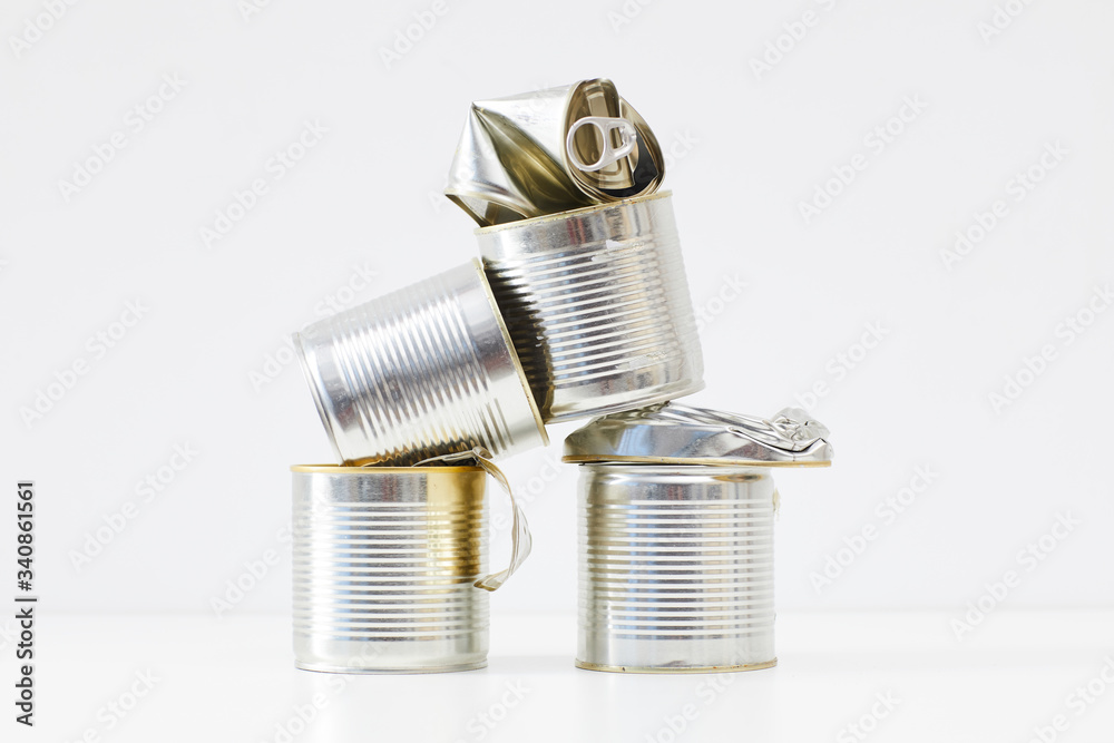 Background image of discarded metal cans isolated on white, waste sorting and recycling concept, copy space Background image of discarded metal cans isolated on white, waste sorting and recycling concept, copy space