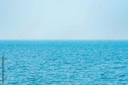 Blue ocean landscape with haze at the upper Gulf of Thailand.
