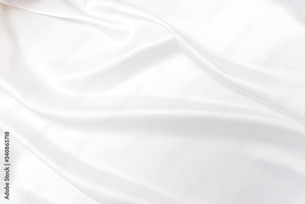 Smooth elegant white silk or satin texture. Luxurious backdrop design