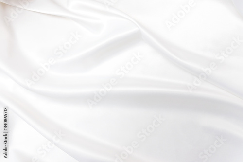 Smooth elegant white silk or satin texture. Luxurious backdrop design © lusyaya