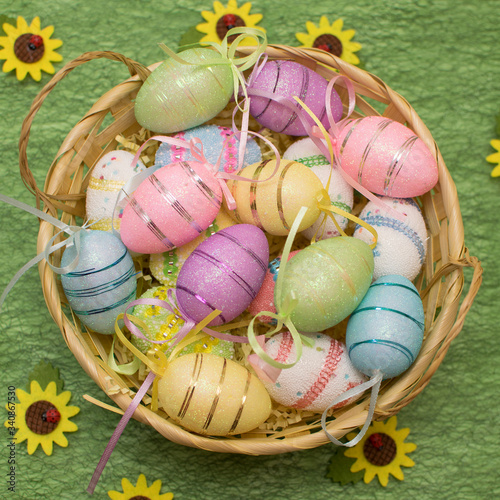 colorful bright eggs in a basket