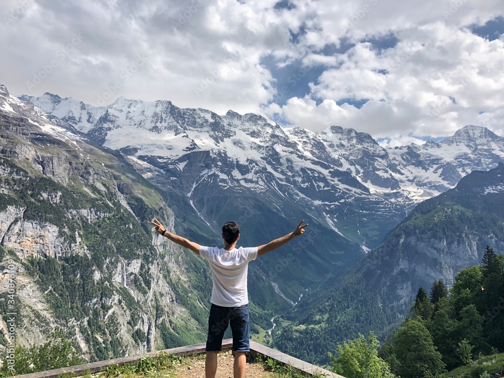 Naklejka premium Man on the top of the mountain