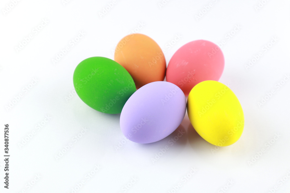 Colorful easter eggs isolated on a white, selective focus Colorful easter eggs isolated on a white, selective focus