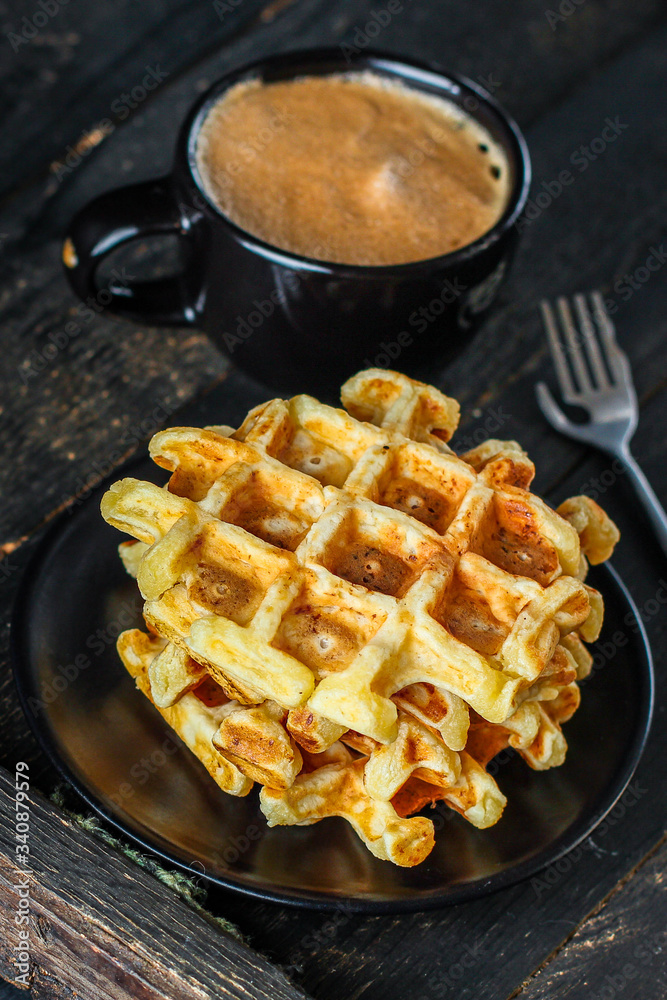 Belgian or american waffles (delicious sweet dish, dessert snack) menu concept. background. top view. copy space for text Belgian or american waffles (delicious sweet dish, dessert snack) menu concept. background. top view. copy space for text