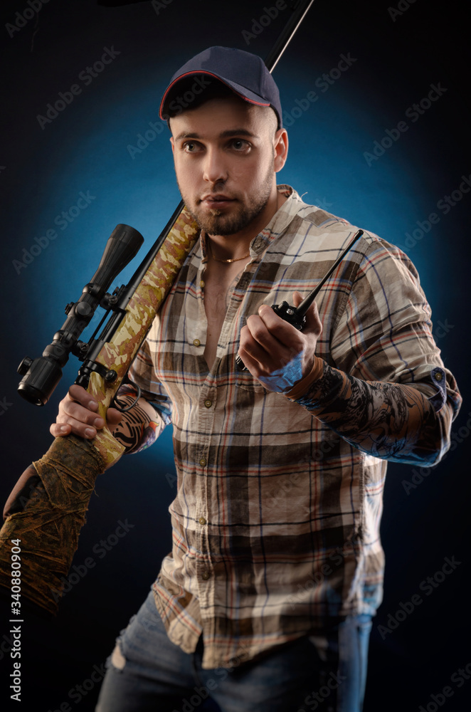 the guy in the shirt with the rifle the guy in the shirt with the rifle