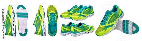 Pair of green sport shoes on isolated on white background with clipping path. Blank new sneakers, copy space. Running shoes