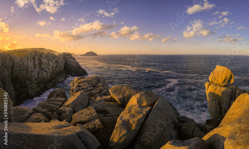 Sea Cliffs Gilted by the Light of the Setting Sun photo