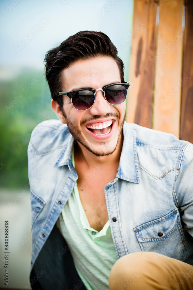 Young man outdoors looking natural Young man outdoors looking natural
