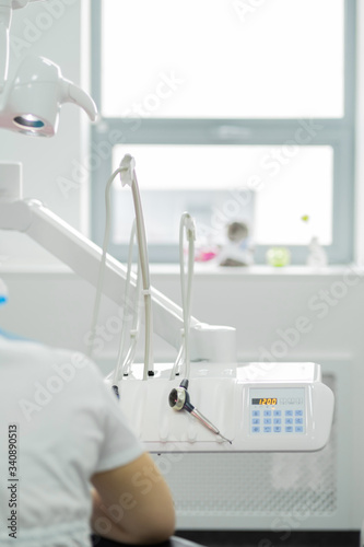 Doctor and dental equipment in a bright spacious office