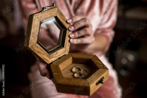 wedding rings in a casket