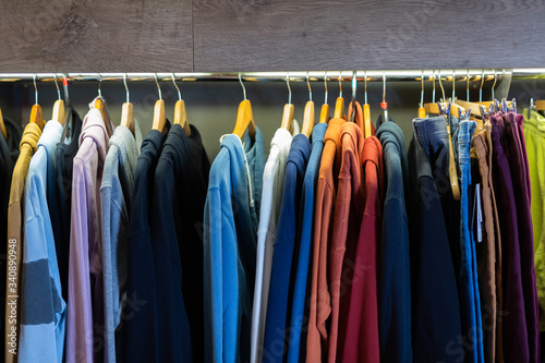 Assortment of summer clothing in modern store