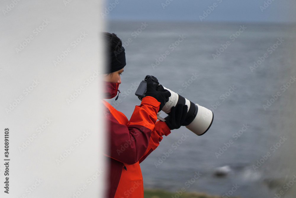 Travel photographer by the sea