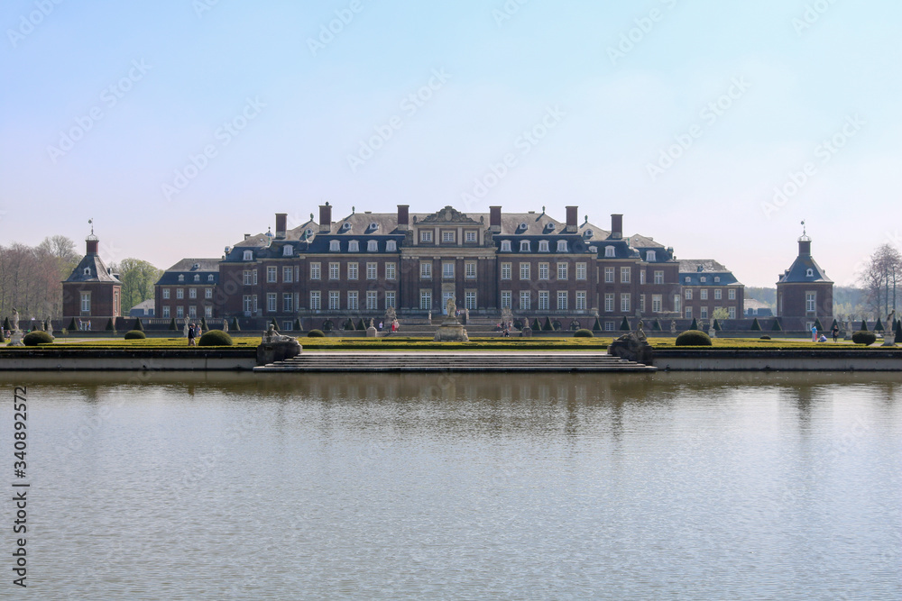 Nordkirchen Palace, The Versailles of Westphalia, with palace gardens and reflections in the lake, Nordkirchen, Germany