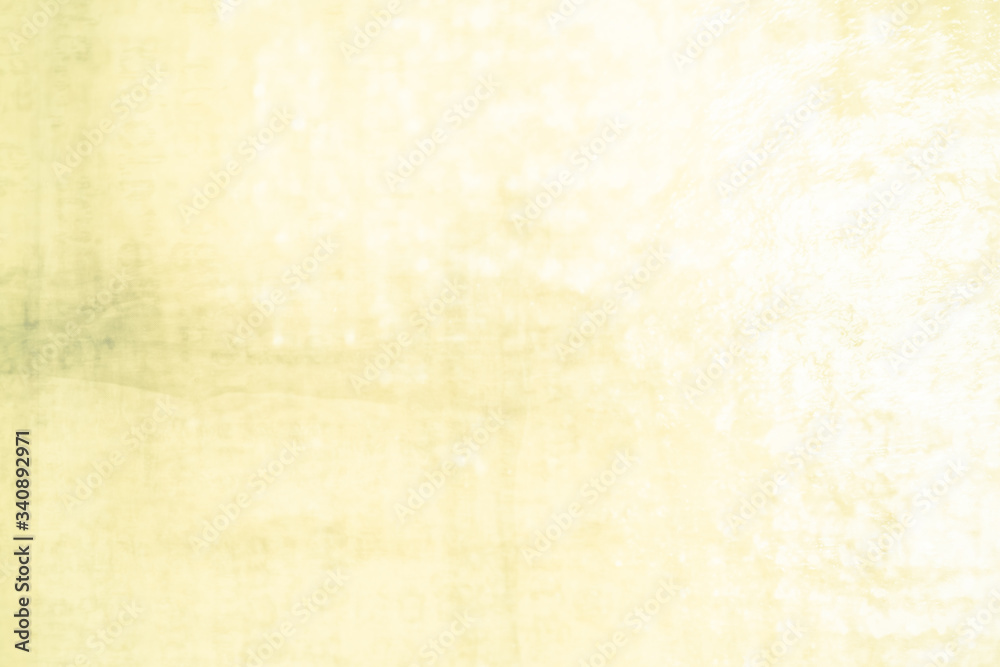 old paper vintage background in pale yellow