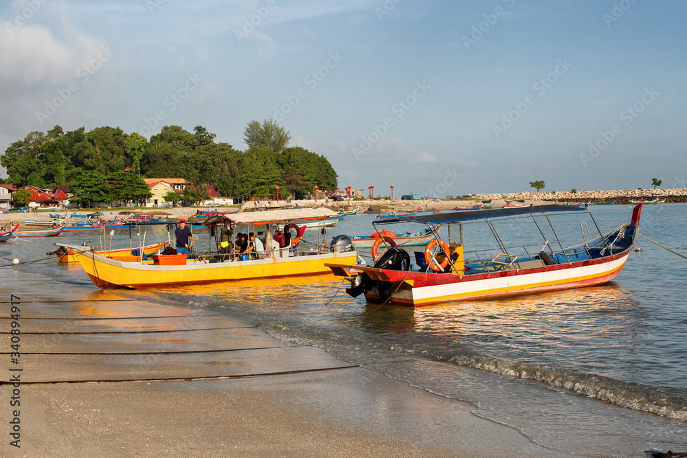 Fototapeta premium Timber fishing boats moored on the beach Penang
