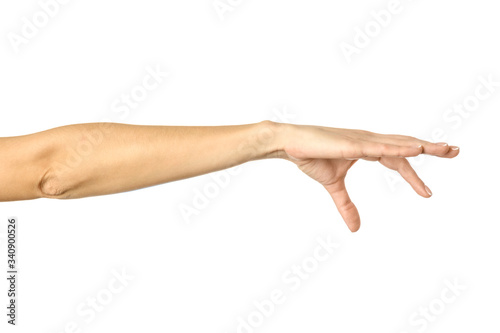 Hand picking, holding, grabbing or reaching. Woman hand gesturing isolated on white